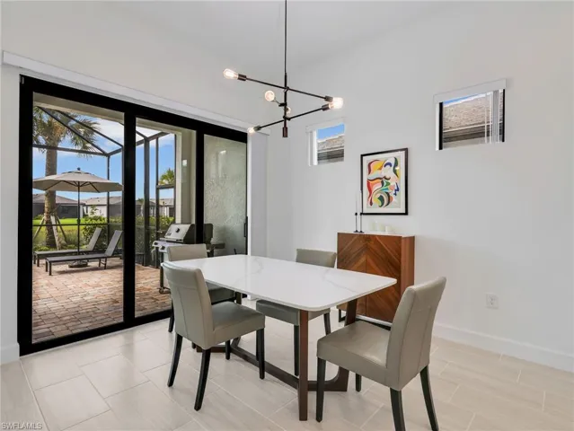 Dining Area with light toned tile flooring