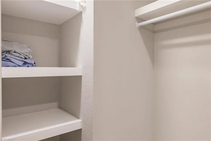 View of ample walk in closet in main bedroom