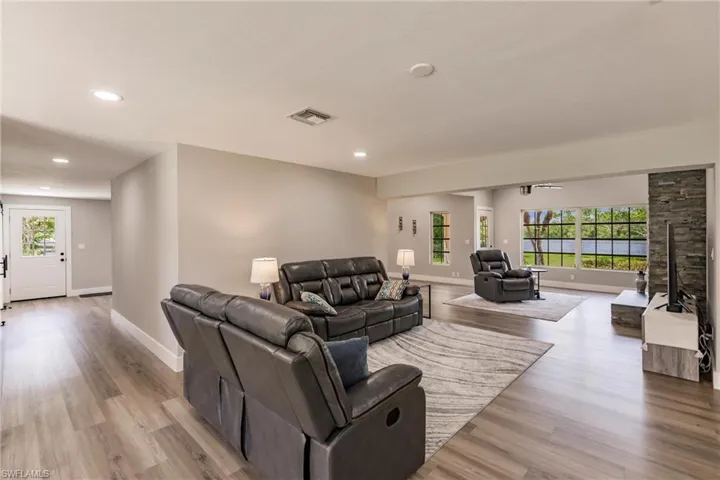 Living room with  LVT/wood-type flooring