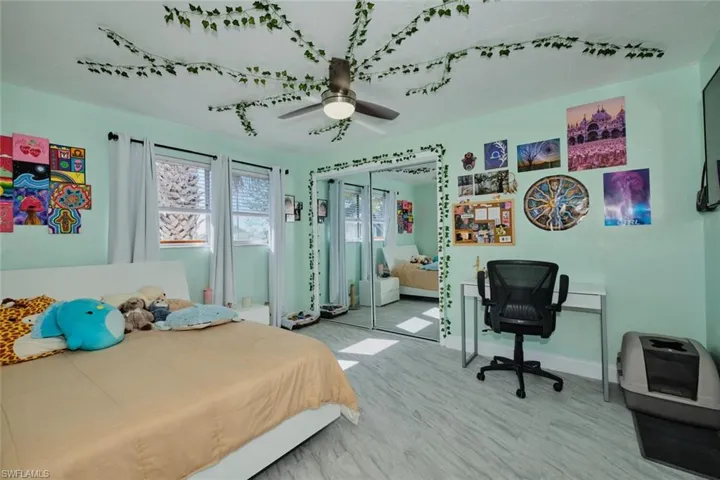 Bedroom with a closet and ceiling fan