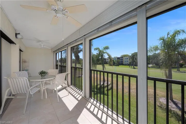 Huge screened lanai with tile floors, storm shutters and outdoor dining area - view 2