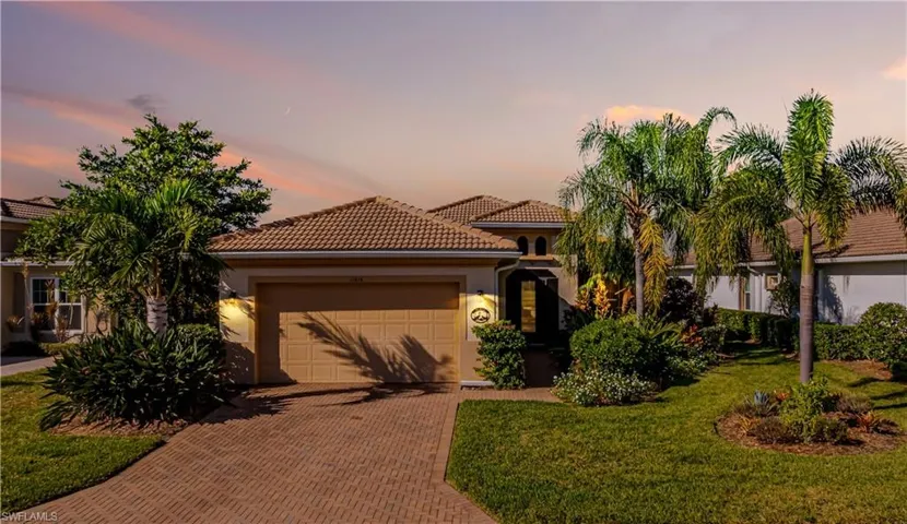 Lush Landscaping, two car garage on quiet street.