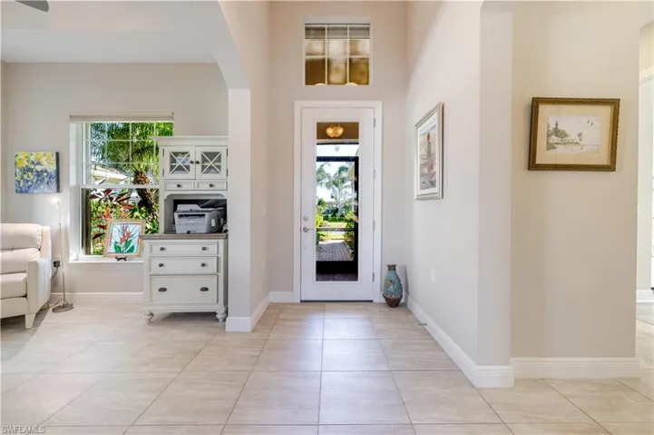 Foyer area, to the left is the flex room can be used as dining, extra seating, office, whatever the homeowner would like.  Bright and spacious.