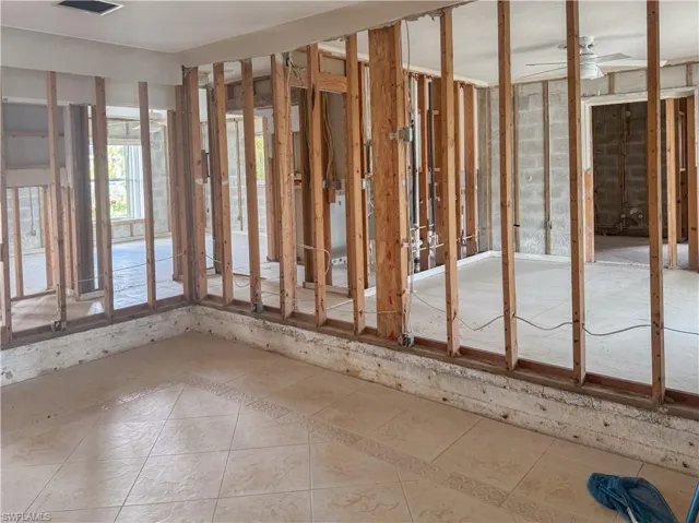Miscellaneous room with tile patterned flooring