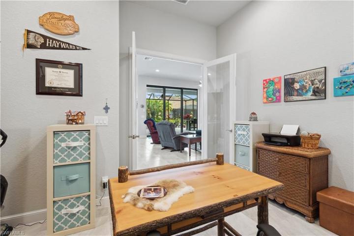 Den with double doors off the great room