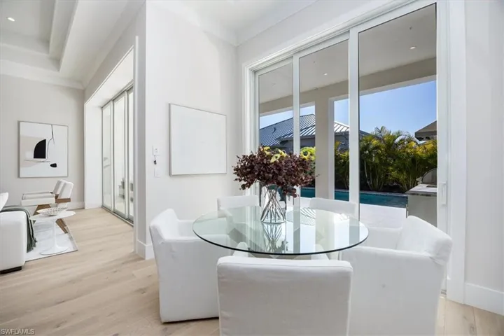 4554 Seagrove Landing Way is a pre-construction customized Dune plan purchase agreement. The photos in this listing are of a recently constructed and staged Dune plan with similar materials and features in the same community. This plan may be built as shown or customized.