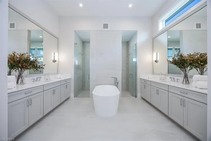 4554 Seagrove Landing Way is a pre-construction customized Dune plan purchase agreement. The photos in this listing are of a recently constructed and staged Dune plan with similar materials and features in the same community. This plan may be built as shown or customized.