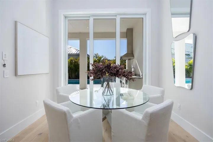 4554 Seagrove Landing Way is a pre-construction customized Dune plan purchase agreement. The photos in this listing are of a recently constructed and staged Dune plan with similar materials and features in the same community. This plan may be built as shown or customized.