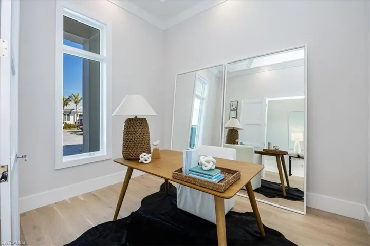 4554 Seagrove Landing Way is a pre-construction customized Dune plan purchase agreement. The photos in this listing are of a recently constructed and staged Dune plan with similar materials and features in the same community. This plan may be built as shown or customized.