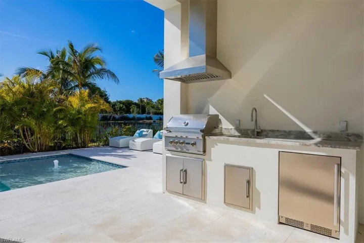 4554 Seagrove Landing Way is a pre-construction customized Dune plan purchase agreement. The photos in this listing are of a recently constructed and staged Dune plan with similar materials and features in the same community. This plan may be built as shown or customized.