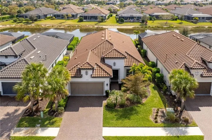 Aerial view of residential area with a large body of water