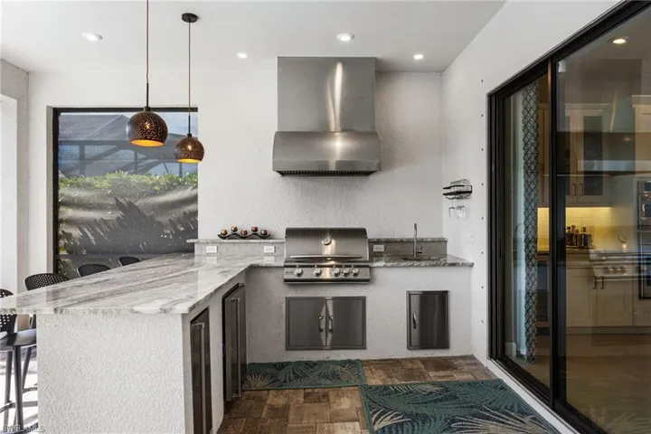 View of patio with area for grilling