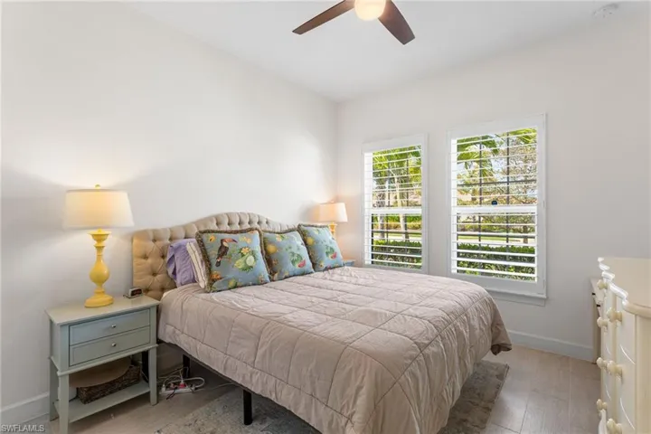 Bedroom featuring light wood-style flooring and ceiling fan