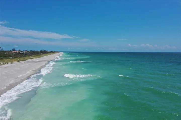 Property view of water with a beach view