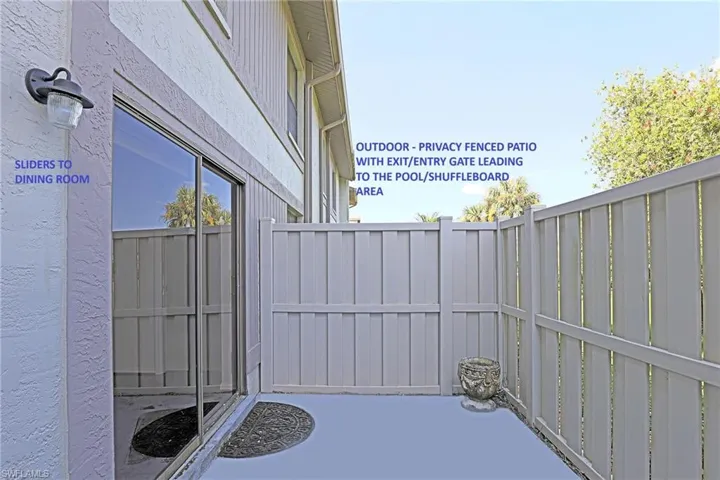 OUTDOOR PATIO --- SLIDERS TO THE DINING AREA --- EXIT/ENTRY GATE ---- ACCESS TO POOL/SHUFFLEBOARD