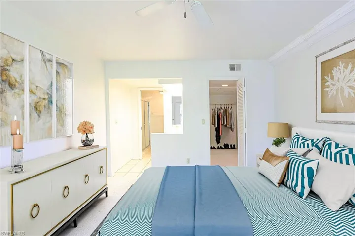 Main Bedroom, Walk-in closet, Main Bathroom. Staged Photo.