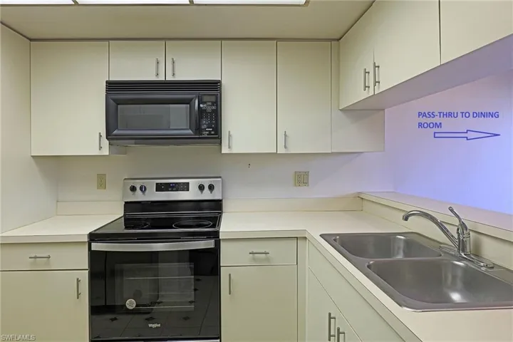 KITCHEN WITH BLACK AND STAINLESS APPLIANCES --- BRAND NEW REFRIGERATORW/WATER & UCE