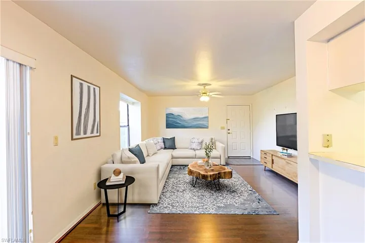 Dining Room to Living Room. Pass-thru to the kitchen. Staged Photo.