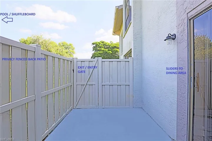 OUTDOOR PATIO --- PRIVACY FENCED --- GATE TO POOL/SHUFFLEBOARD AREA --- SLIDERS TO THE DINING ROOM AREA