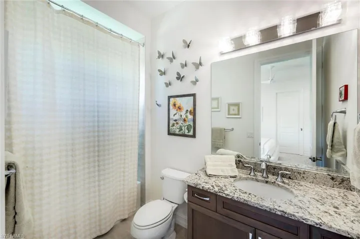 Guest bathroom with bathtub