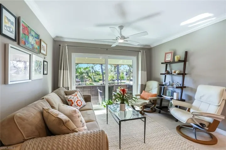 Family room w/ sliders to an Open Balcony
