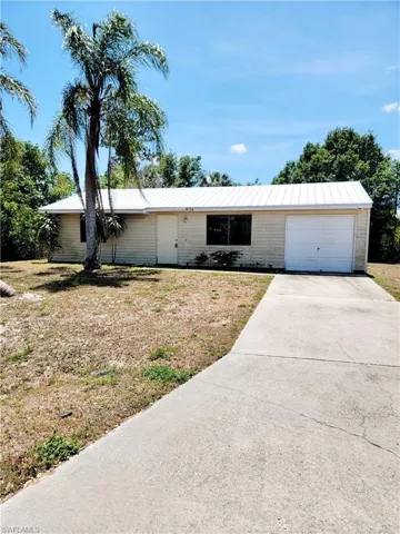 704 W Cleveland  LN, Lehigh Acres, FL 33936