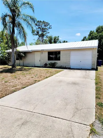 704 W Cleveland  LN, Lehigh Acres, FL 33936