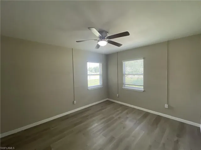 Bedroom featuring a ceiling fan