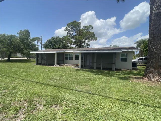 Front of property featuring a screened in porch for each unit