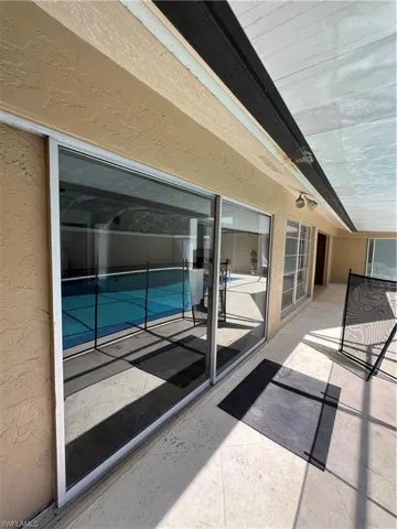 Outdoor pool with a patio area