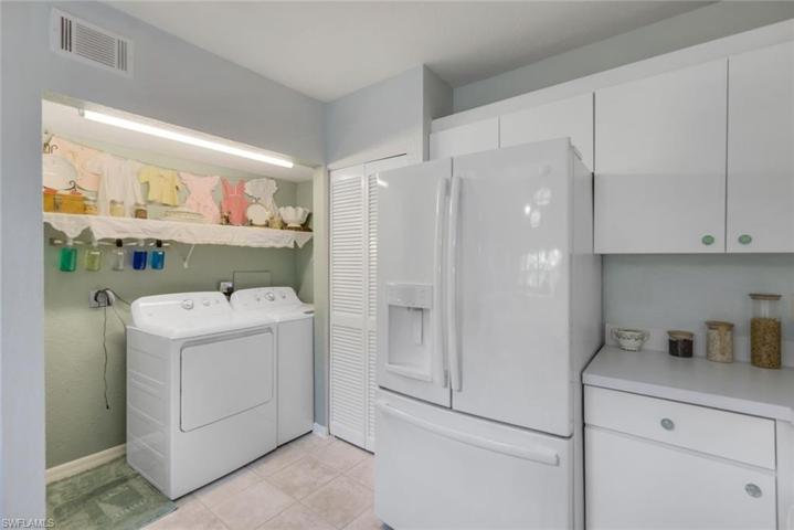 This open laundry closet allows the air flow and the ease of loading & unloading