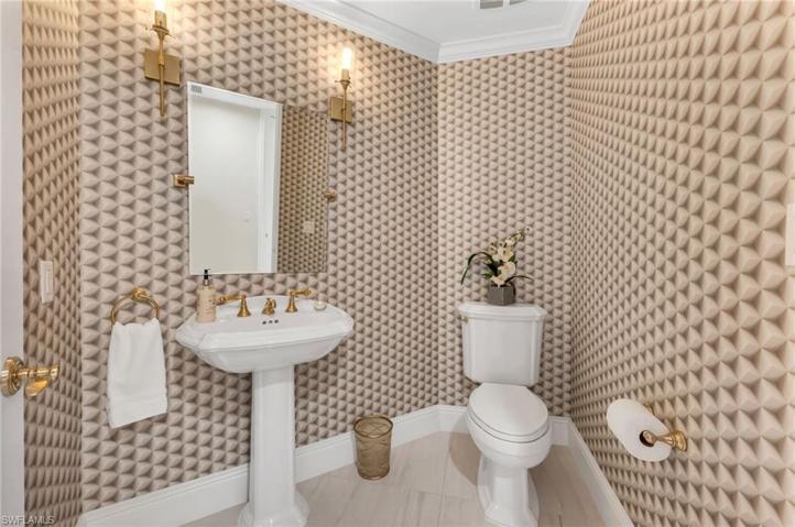 Your guests will love this swanky guest bath...sets the tone for this great condo!