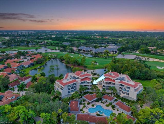 There are two buildings in L'Ermitage, with eight condos in each building, with a large pool, spa, and cabanas surrounding the pool.