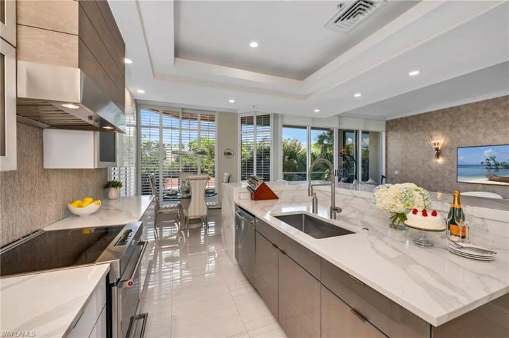 Fabulous updated kitchen has large island for plenty of prep space and room for your creations.