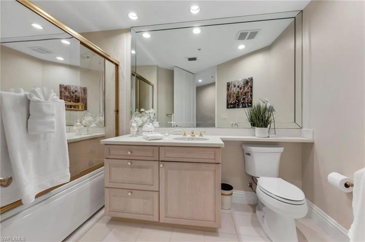 The bathroom has a tub (for any grand babies!) and is perfect for your guests' stays.