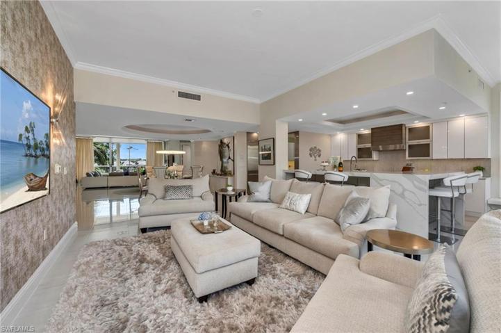 The family room has an open concept floor plan, overlooking the updated kitchen and dining room.