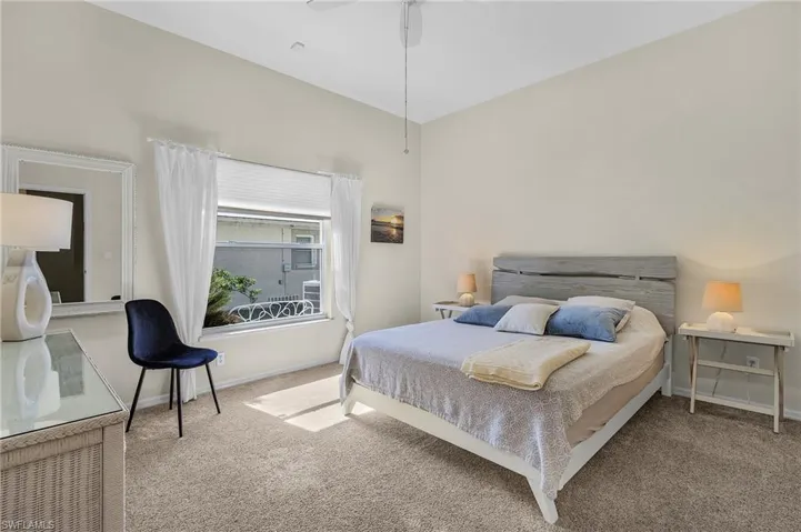 Carpeted bedroom with baseboards