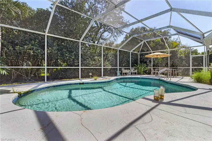 Outdoor pool with a patio