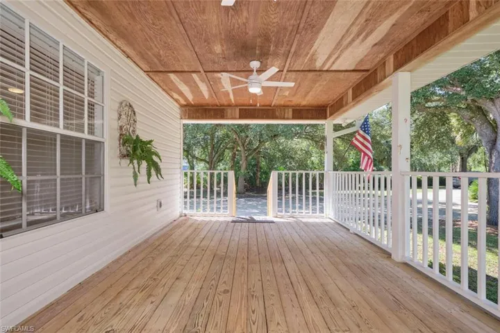 Front porch feature cypress wood ceilings