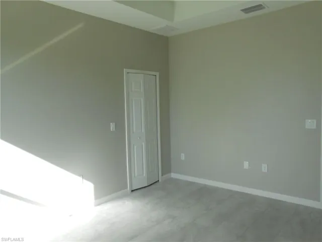 Empty room with baseboards