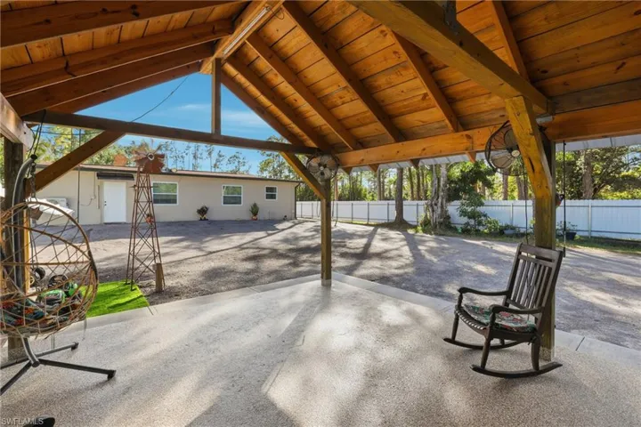 Fenced backyard with a patio area