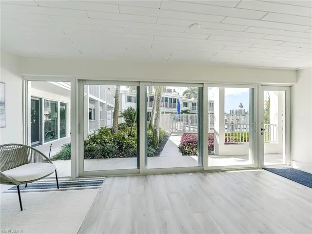 Doorway to outside featuring wood finished floors