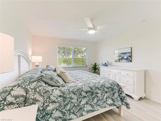 Bedroom featuring light wood-type flooring and ceiling fan