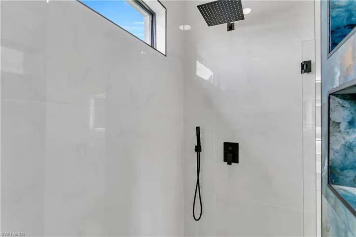 Bathroom with tiled shower