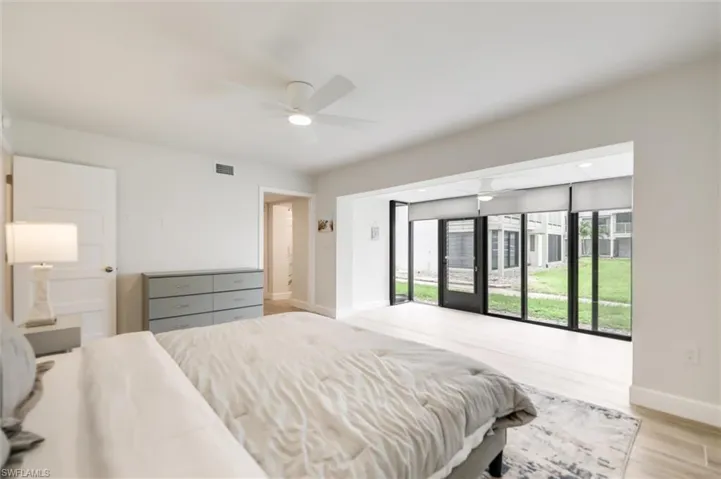 Bedroom featuring light wood-style floors and ceiling fan