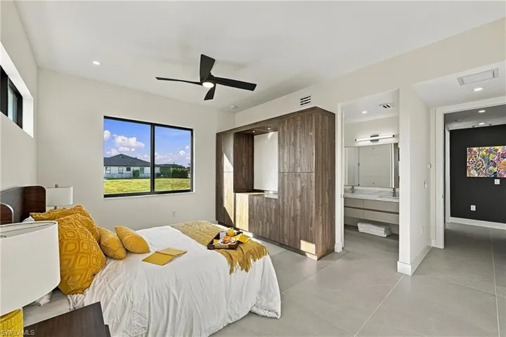Beautifully appointed private guest suite with en-suite bathroom with Italian Burlington Cream porcelain flooring