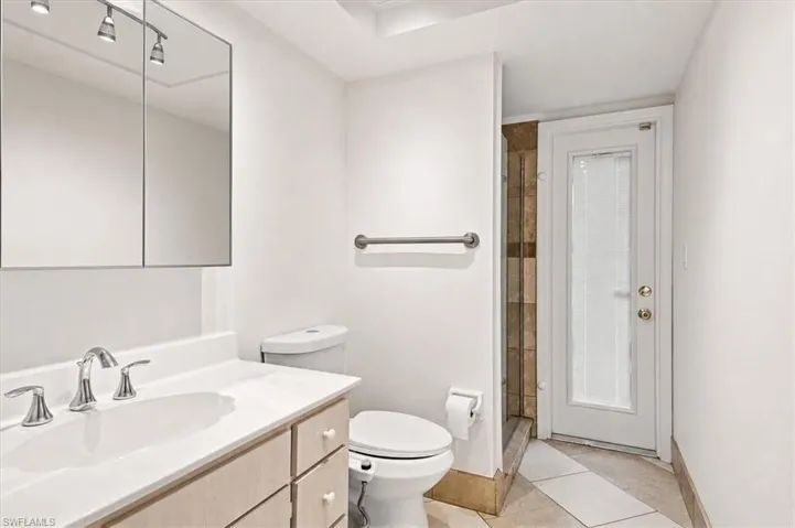 3rd full bathroom with door to pool area