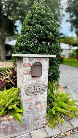 Beautiful stone pillar holding mailbox