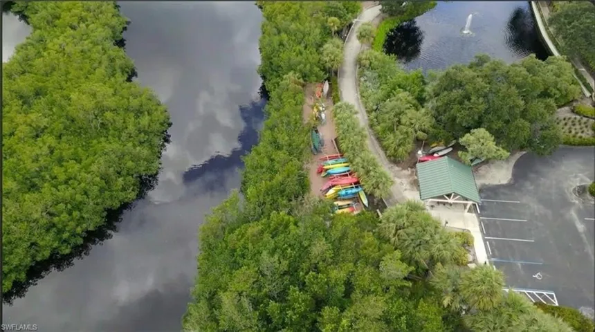 Aerial overview of property's location featuring a nearby body of water
