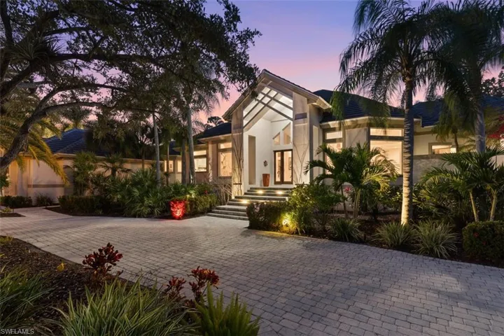 Modern home featuring stucco siding